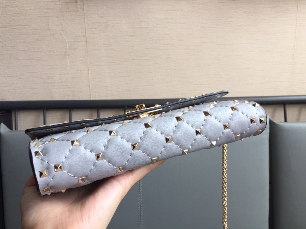 Valentino Rockstud Spike Crossbody Clutch Bag In Blue Lambskin