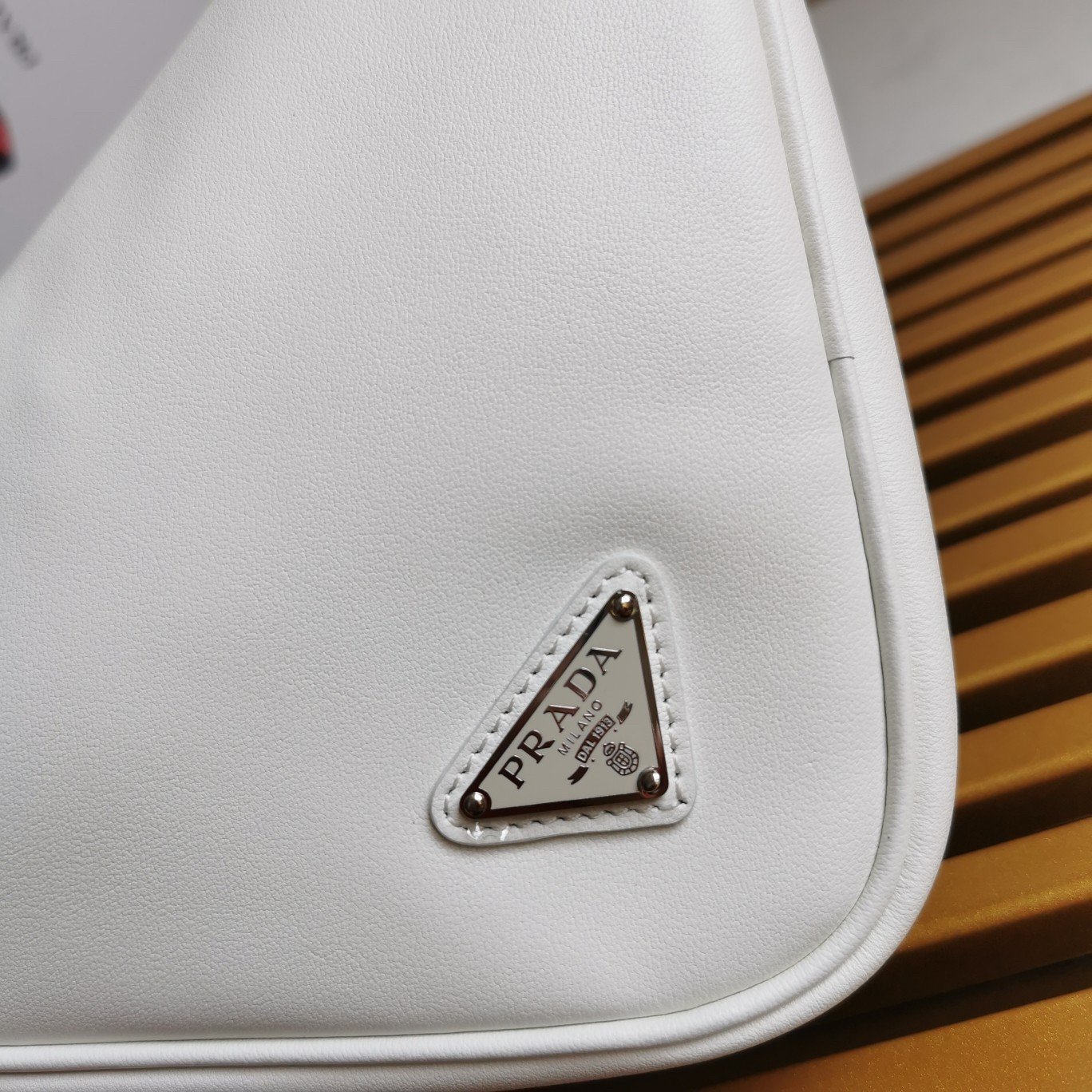 Prada Triangle Pouch Bag In White Calfskin