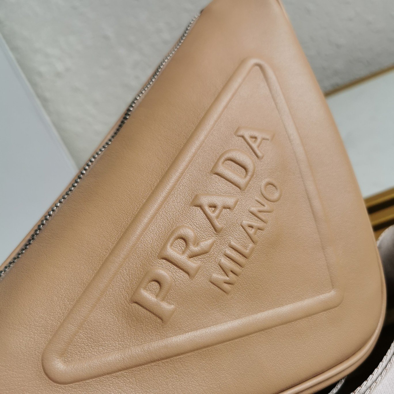 Prada Triangle Shoulder Bag In Beige Calfskin