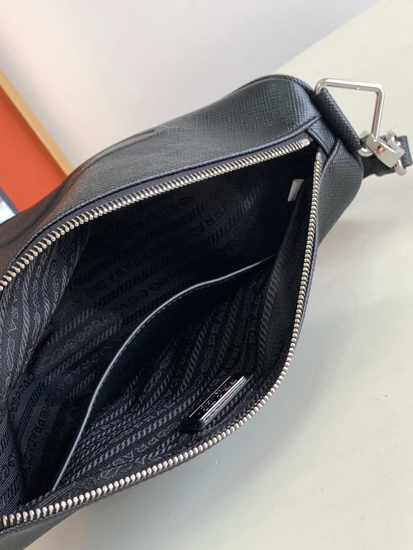 Prada Triangle Shoulder Bag In Black Saffiano Leather