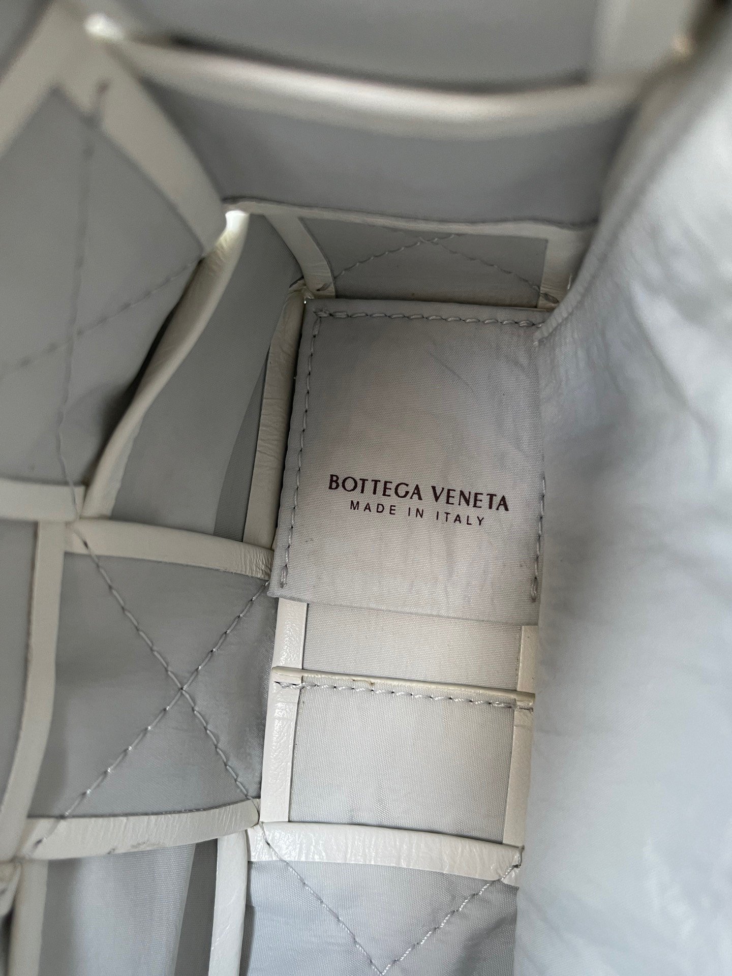 Bottega Veneta Cassette Bag In White Wrinkled Intreccio Calfskin