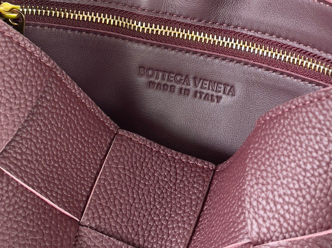 Bottega Veneta Cassette Bag In Burgundy Grained Intreccio Calfskin