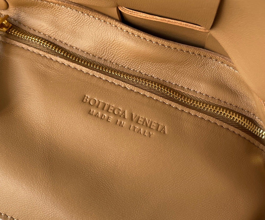 Bottega Veneta Cassette Bag In Caramel Intreccio Lambskin