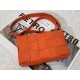 Bottega Veneta Cassette Bag In Orange Intreccio Lambskin