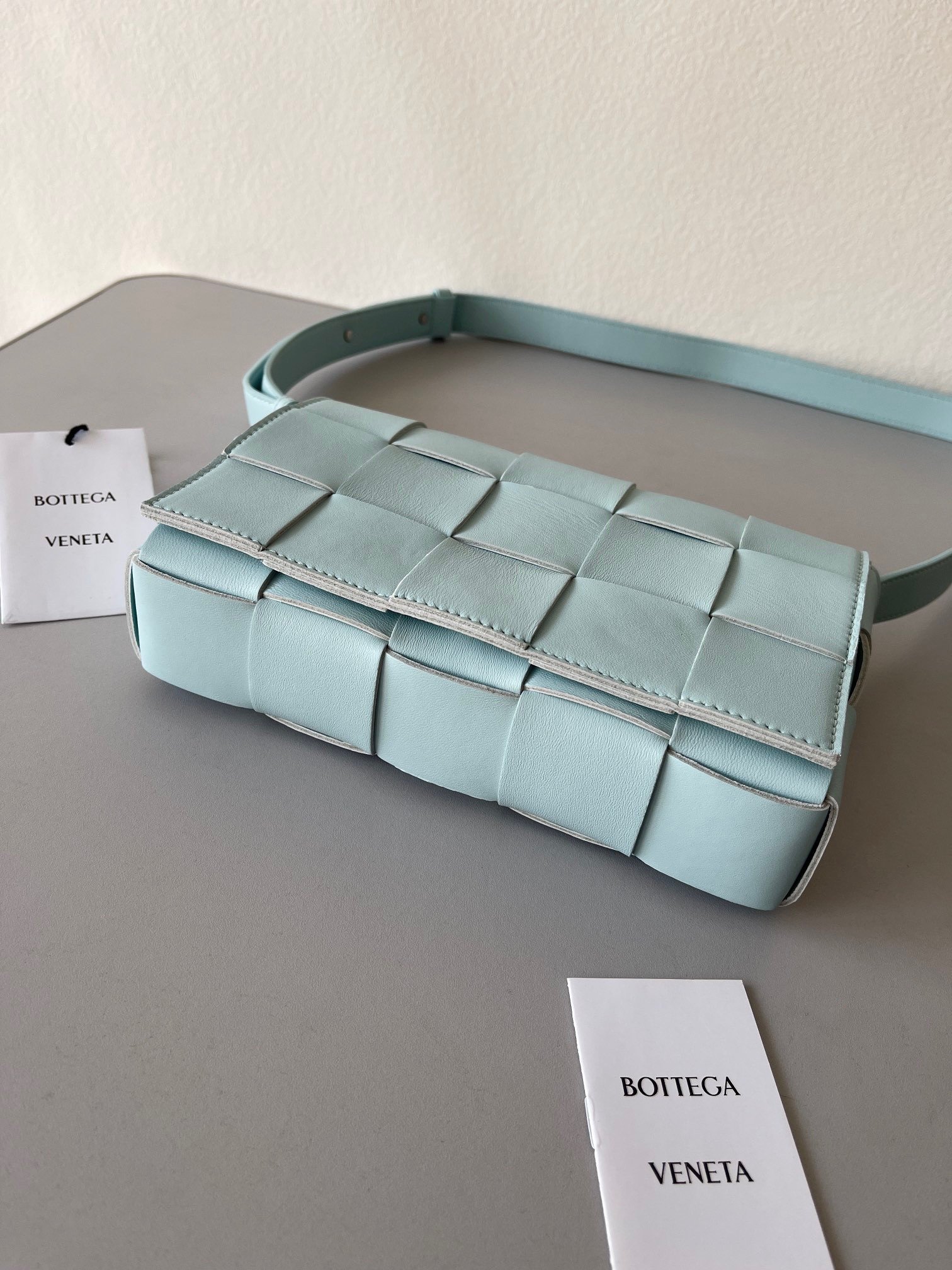 Bottega Veneta Cassett Bag In Teal Washed Intreccio Lambskin