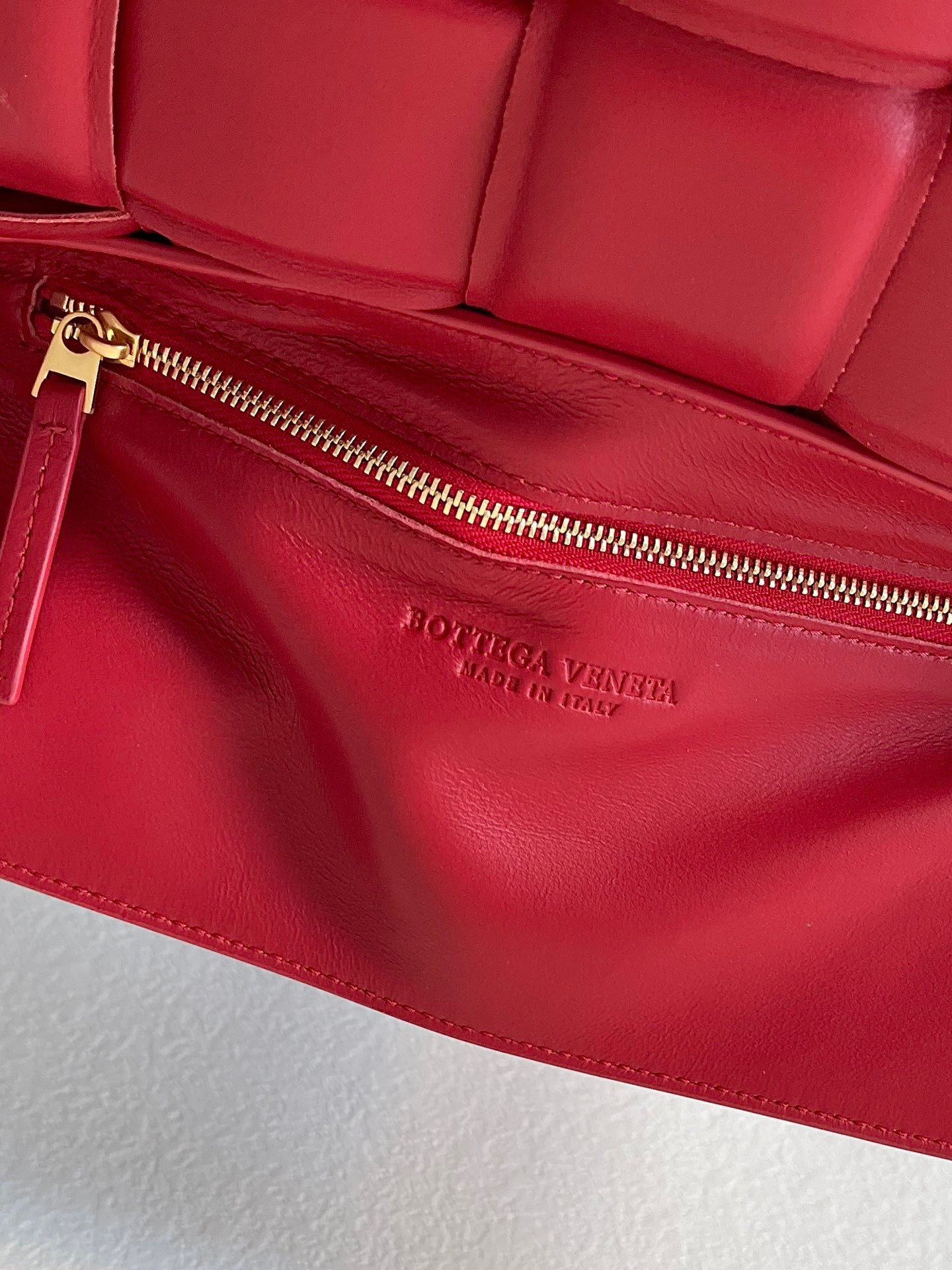 Bottega Veneta Padded Cassette Bag In Red Intrecciato Deerskin