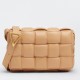 Bottega Veneta Padded Cassette Bag In Almond Intrecciato Lambskin