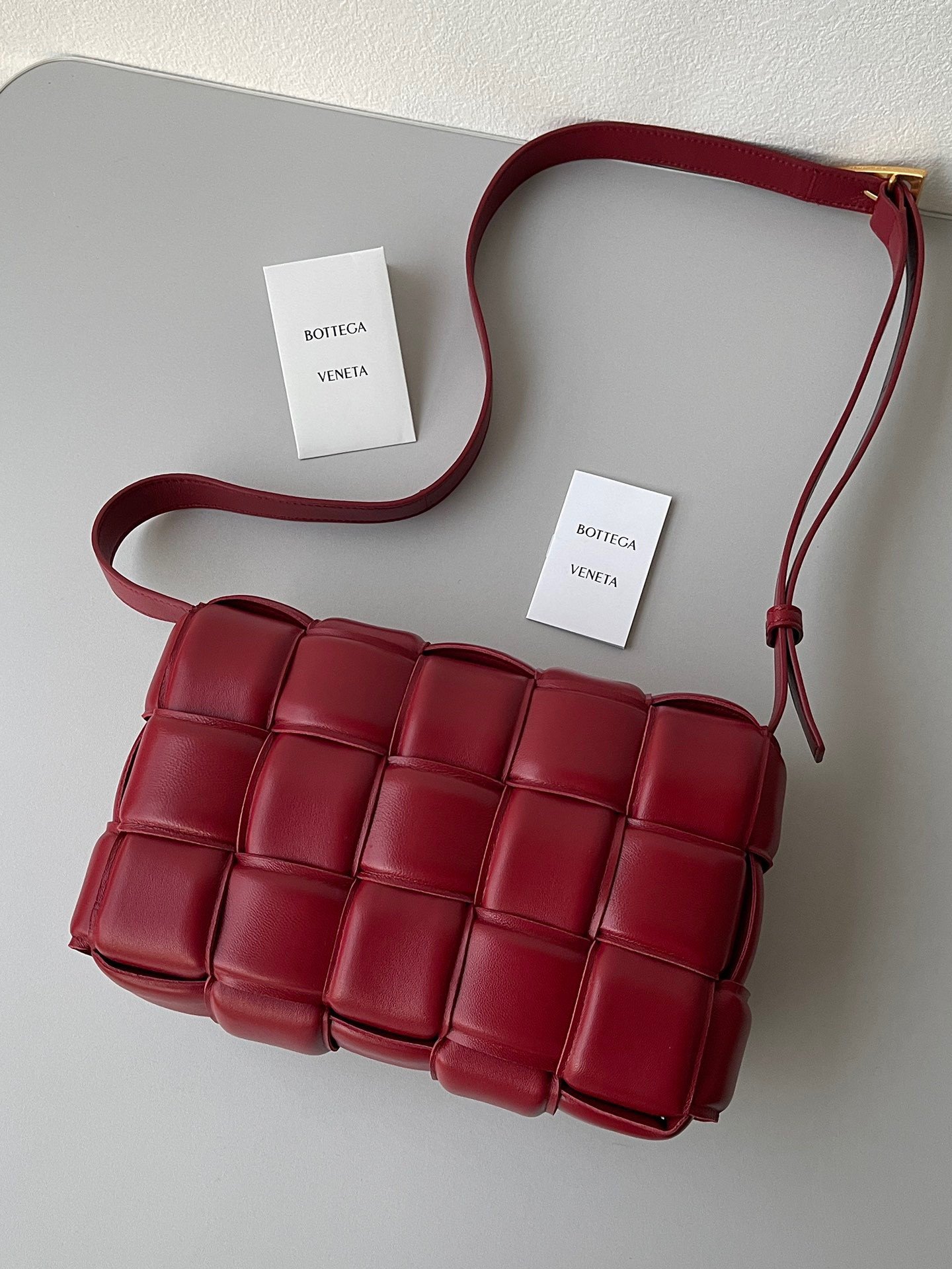 Bottega Veneta Padded Cassette Bag In Dark Red Intrecciato Lambskin