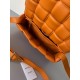 Bottega Veneta Padded Cassette Bag In Orange Intrecciato Lambskin