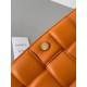 Bottega Veneta Padded Cassette Bag In Orange Intrecciato Lambskin