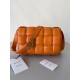 Bottega Veneta Padded Cassette Bag In Orange Intrecciato Lambskin