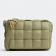 Bottega Veneta Padded Cassette Bag In Travertine Intrecciato Lambskin