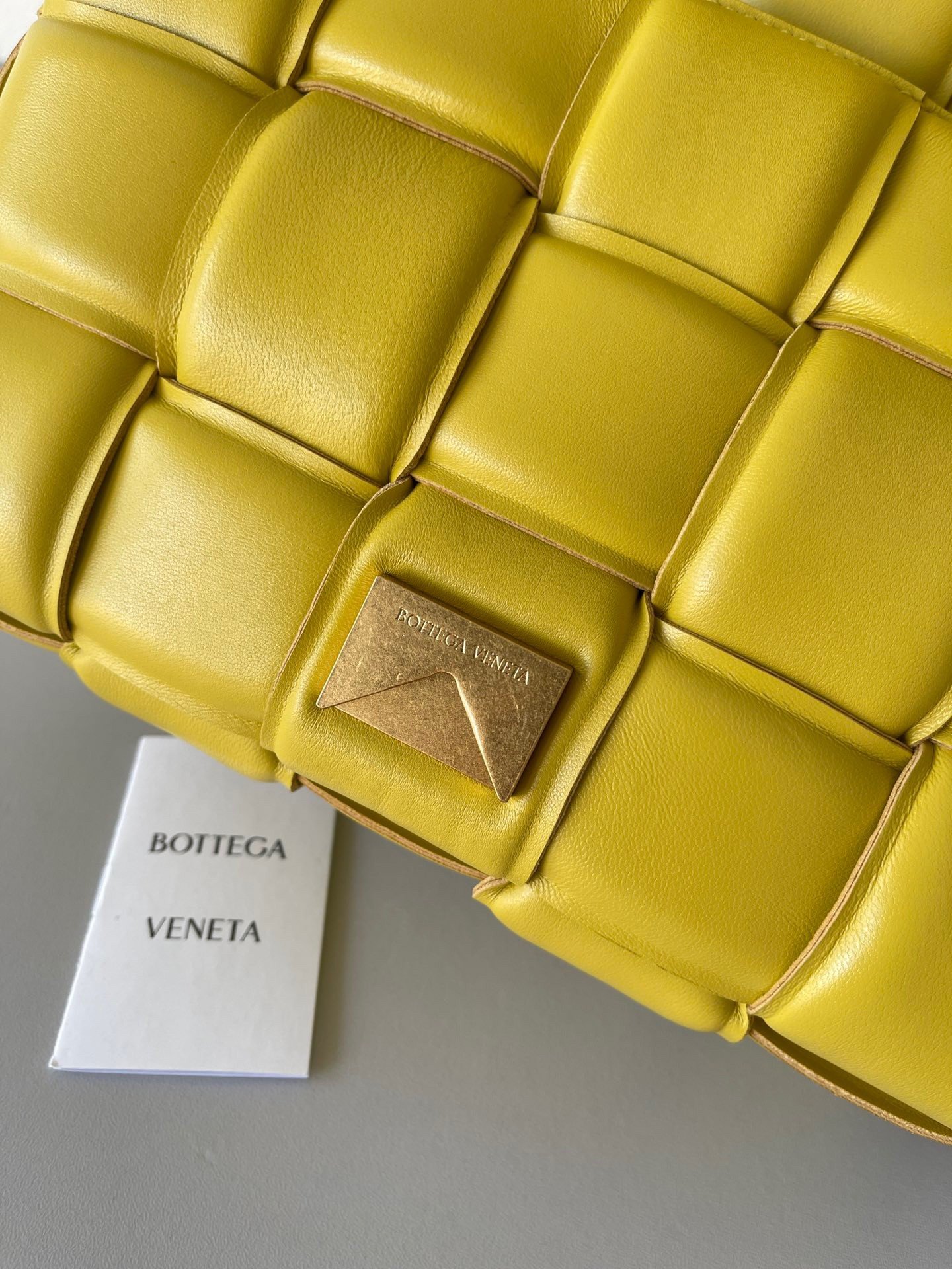 Bottega Veneta Padded Cassette Bag In Yellow Intrecciato Lambskin