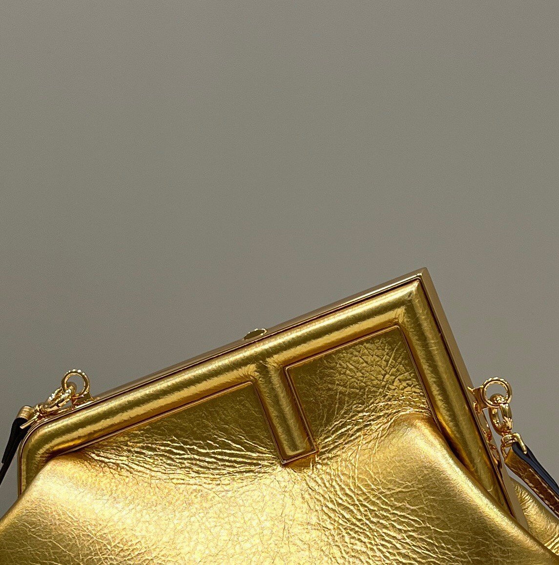 Fendi First Small Bag In Gold Laminated Leather