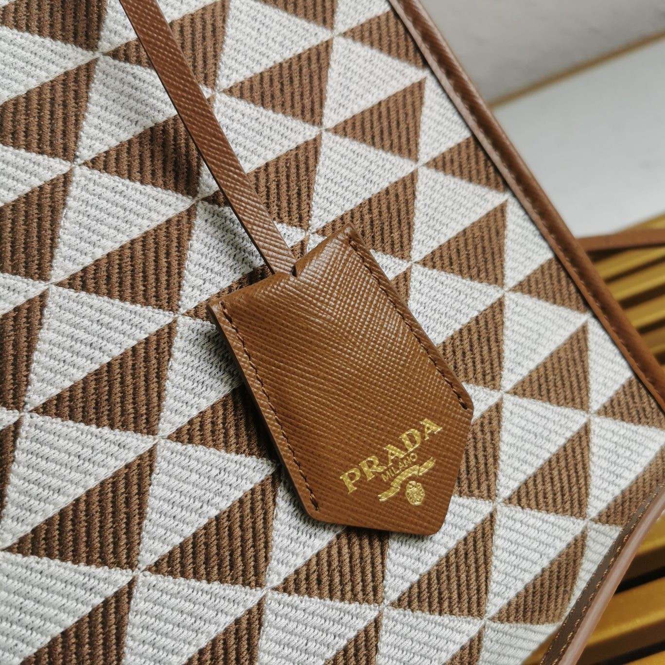 Prada Symbole Micro Bag In White/Brown Jjacquard Fabric