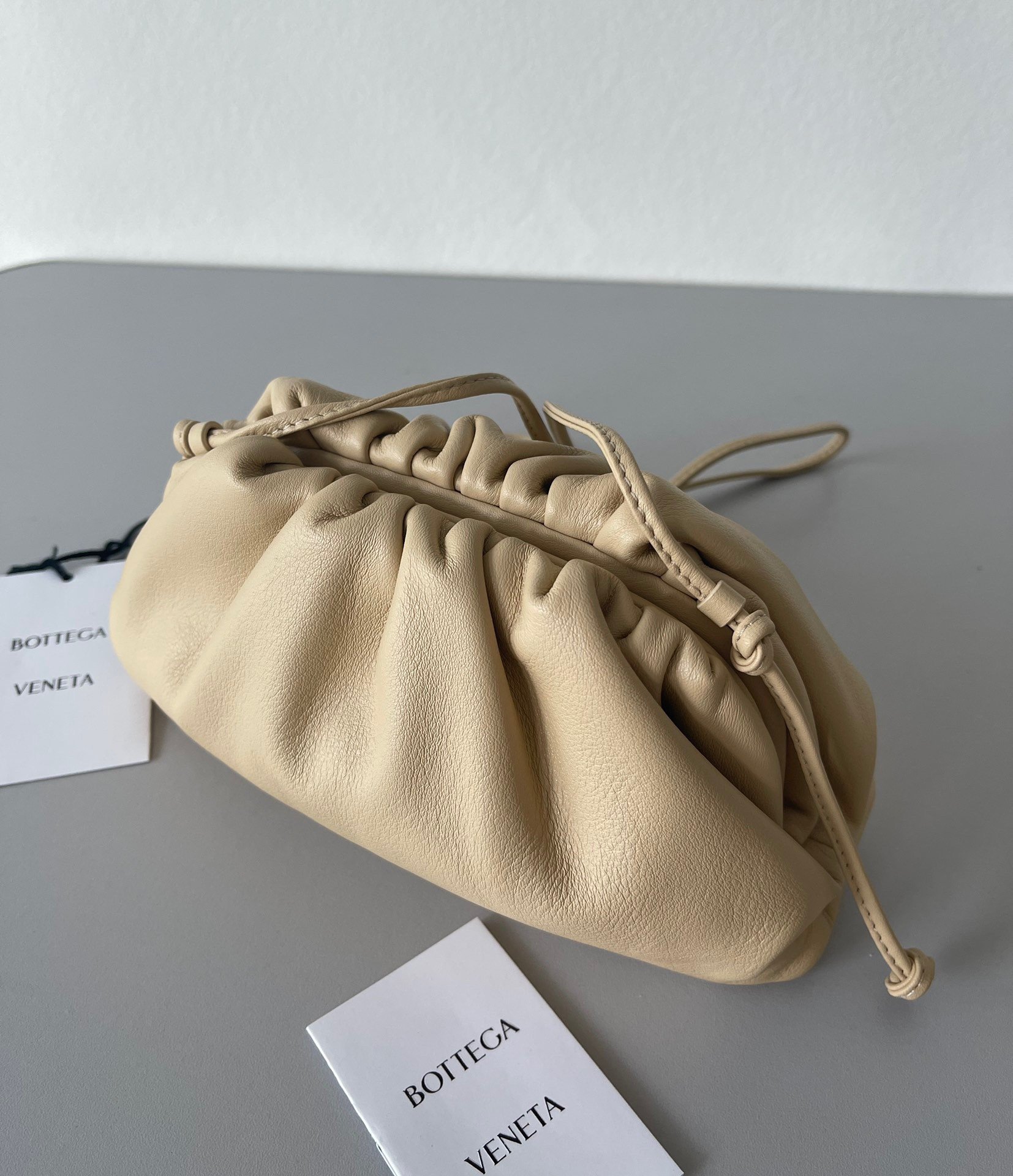 Bottega Veneta Mini Pouch with Strap in Almond Calfskin