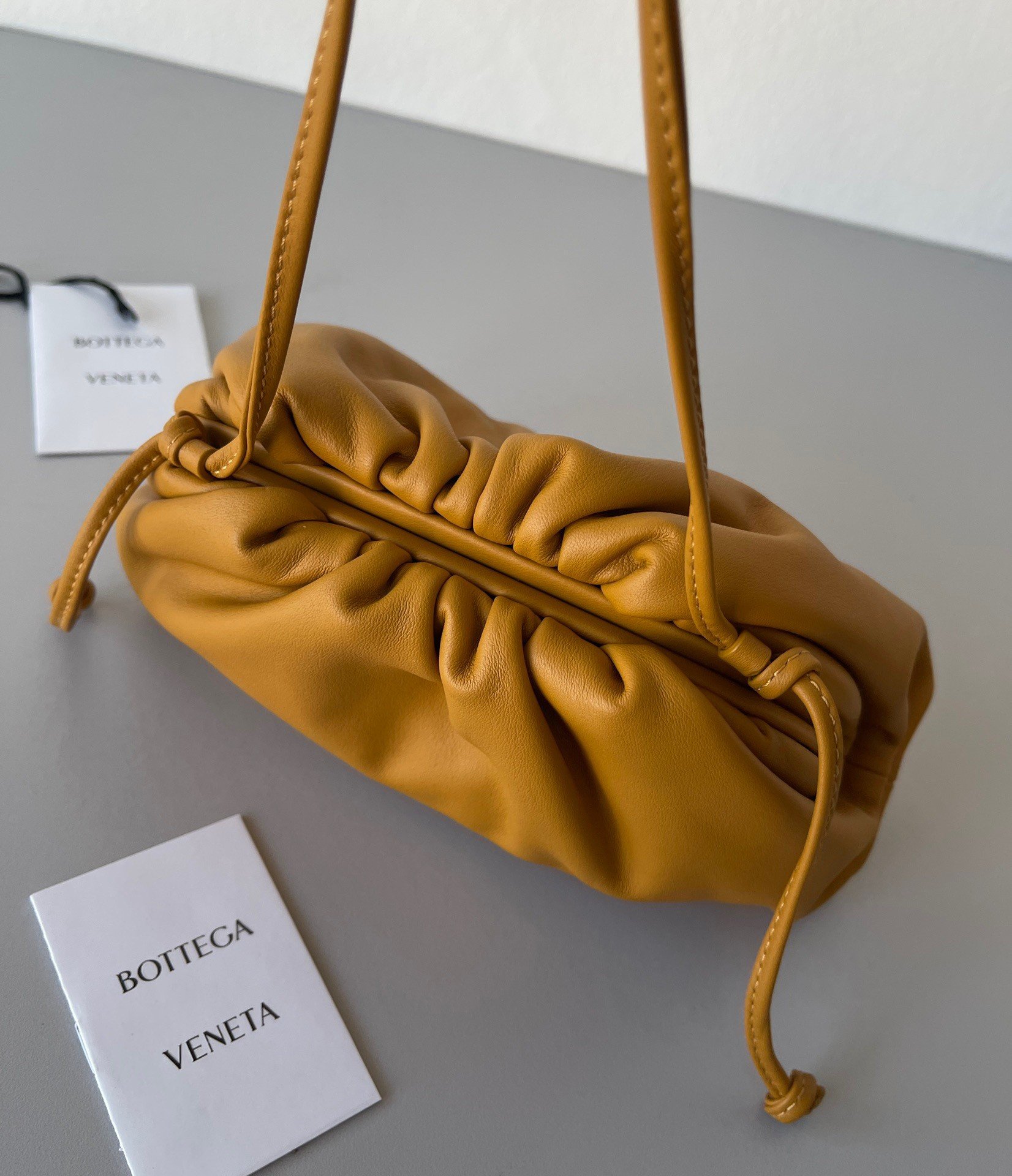 Bottega Veneta Mini Pouch with Strap in Teak Calfskin