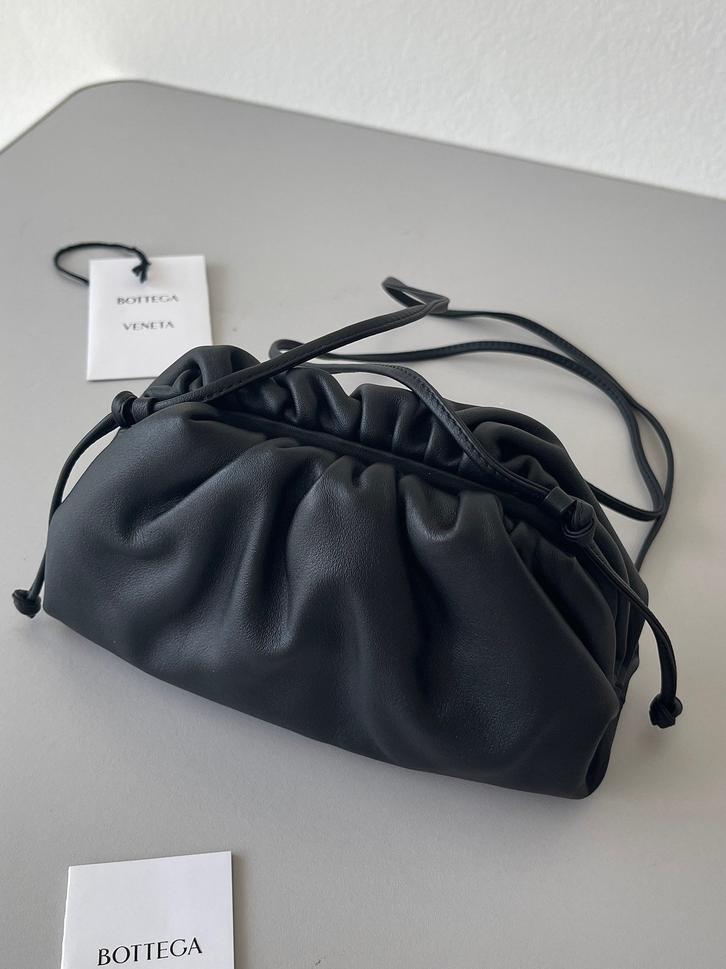 Bottega Veneta Mini Pouch with Strap in Black Calfskin