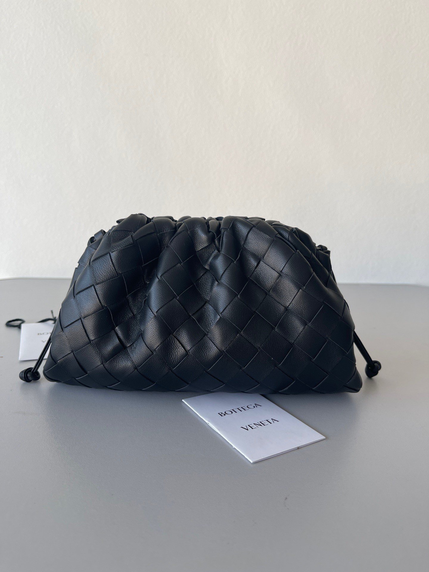 Bottega Veneta Mini Pouch with Strap in Black Intrecciato Lambskin