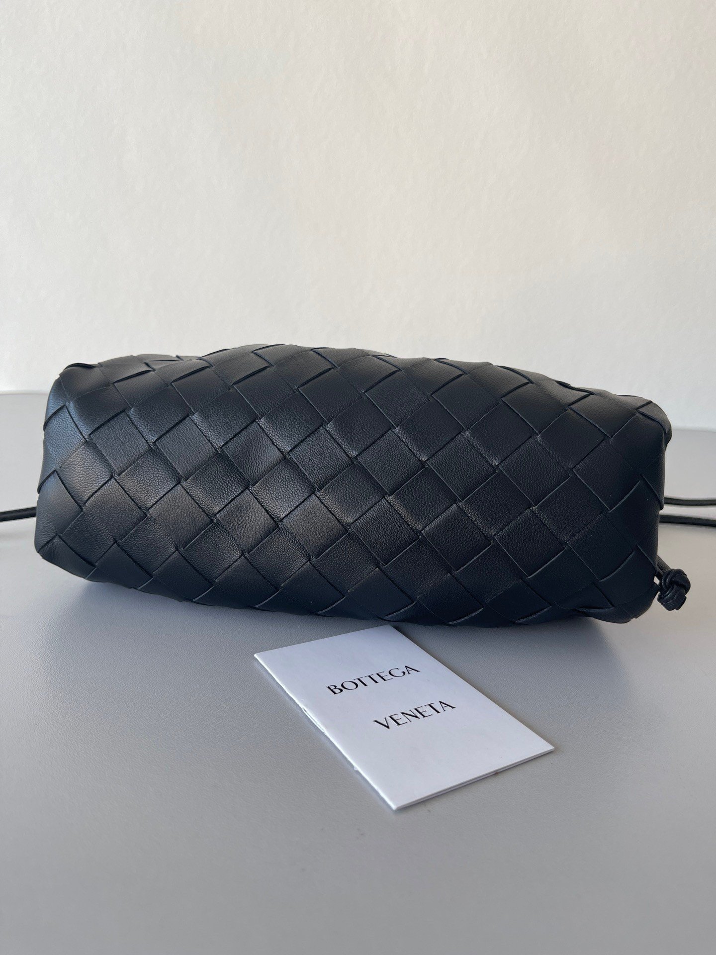 Bottega Veneta Mini Pouch with Strap in Black Intrecciato Lambskin