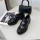 Prada Women's Loafers In Black Brushed Leather