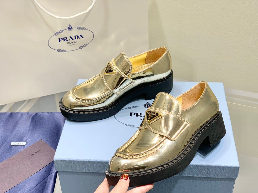 Prada Women's Loafers In Gold Metallic Leather