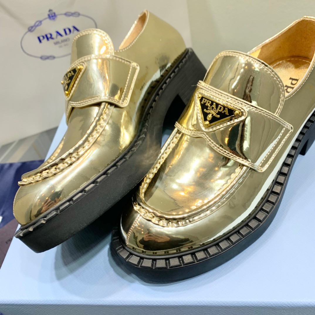 Prada Women's Loafers In Gold Metallic Leather