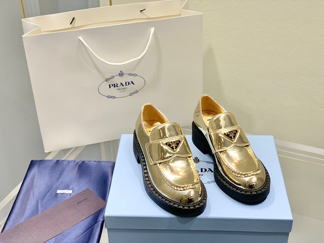 Prada Women's Loafers In Gold Metallic Leather