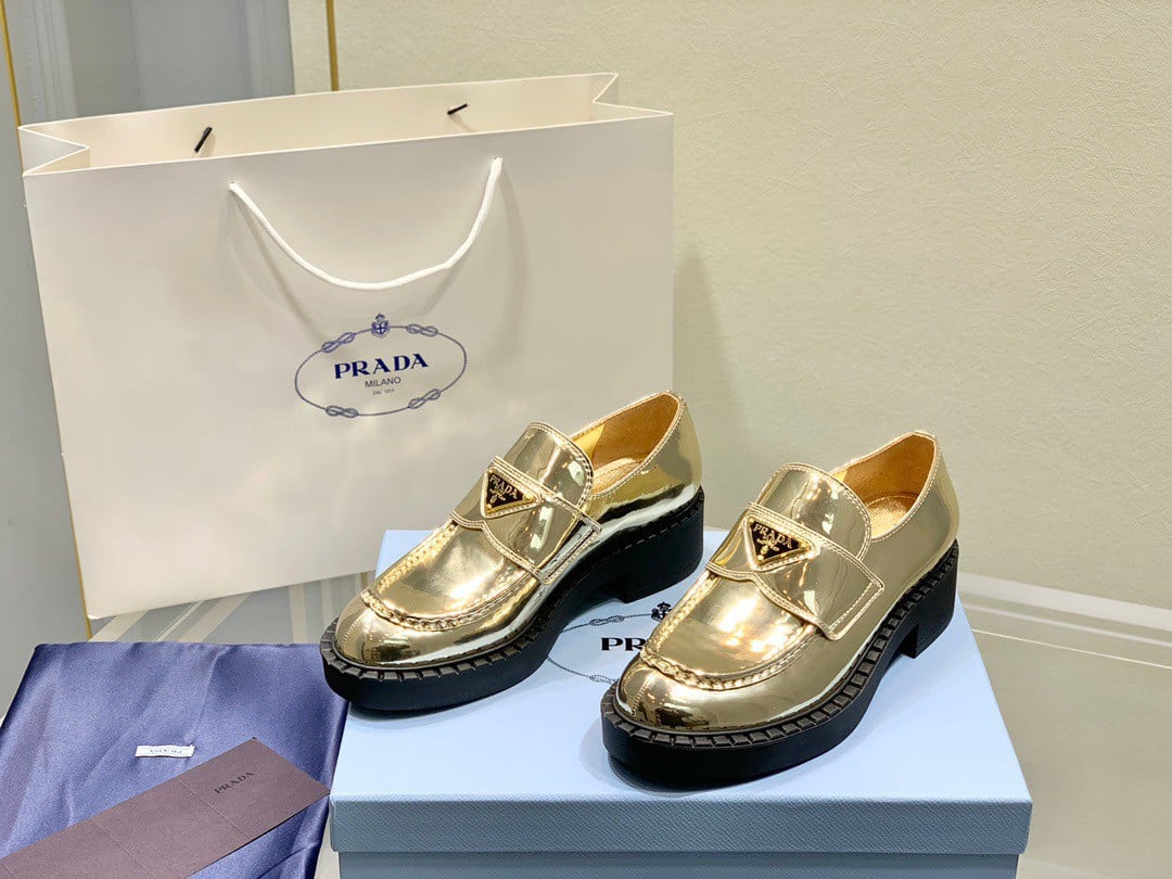 Prada Women's Loafers In Gold Metallic Leather