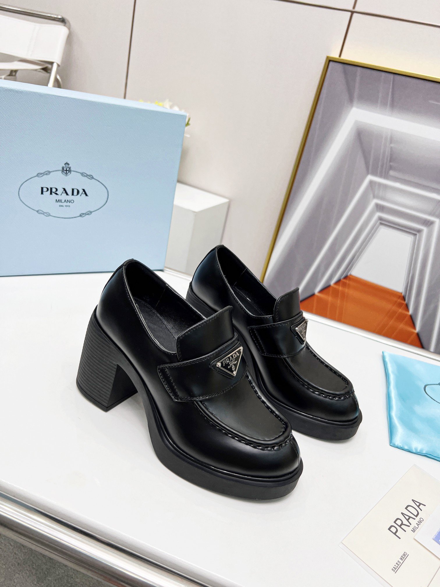 Prada Chocolate High-heeled Loafers In Black Brushed Leather