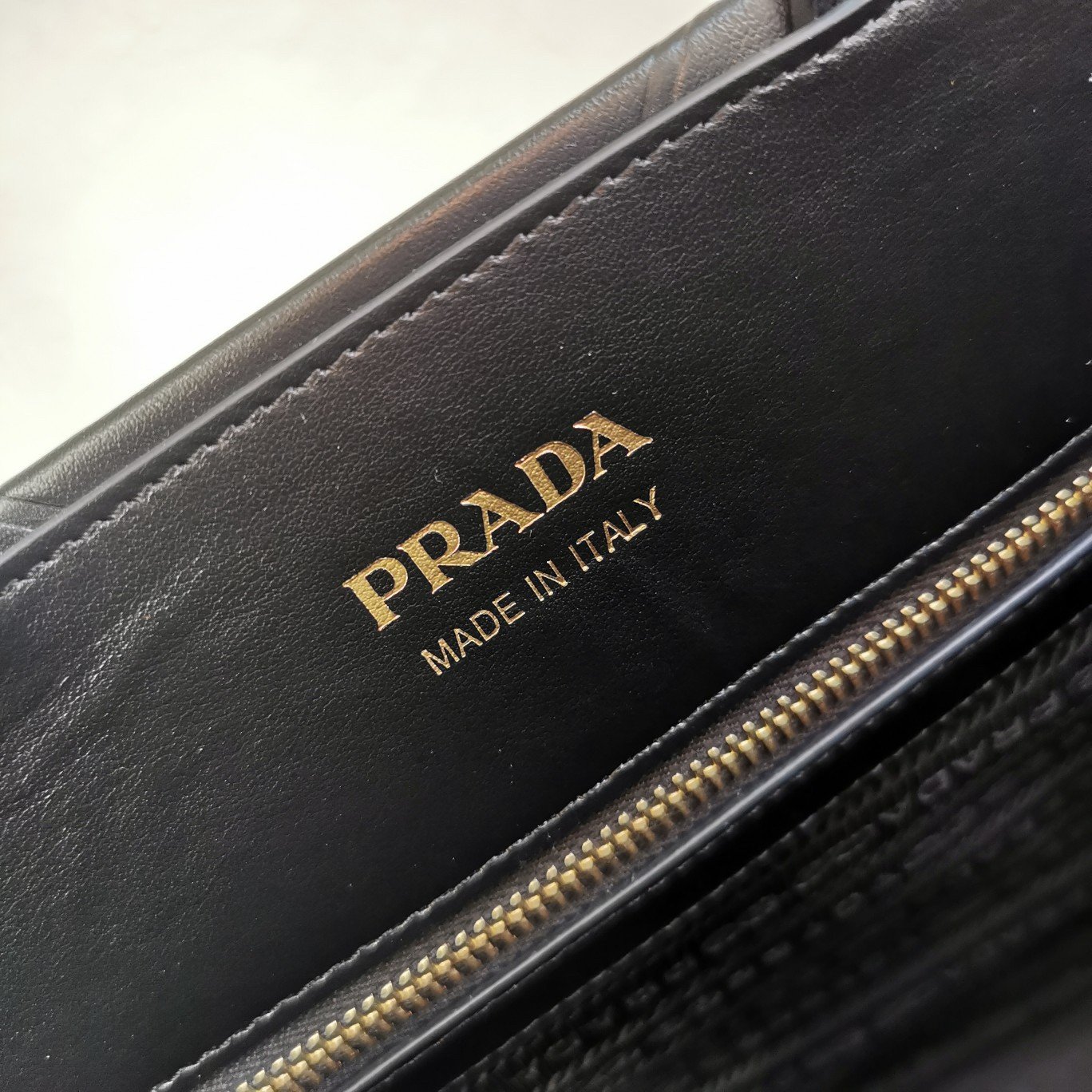 Prada Symbole Small Bag with Topstitching in Black Leather