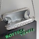 Bottega Veneta Knot Minaudiere On Strap In Silver Intreccio Laminated Leather