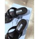 Prada Heeled Thong Sandals In Black Brushed Leather