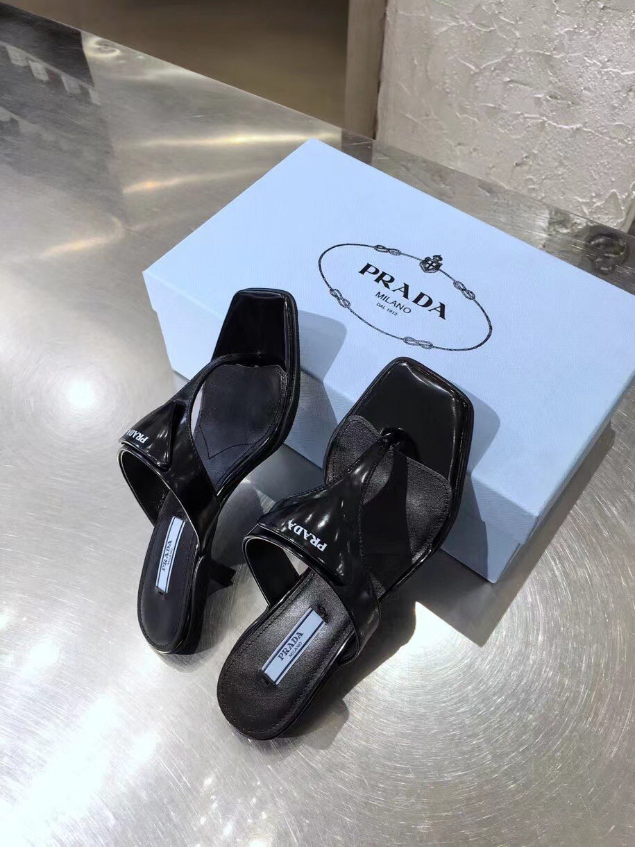 Prada Heeled Thong Sandals In Black Brushed Leather