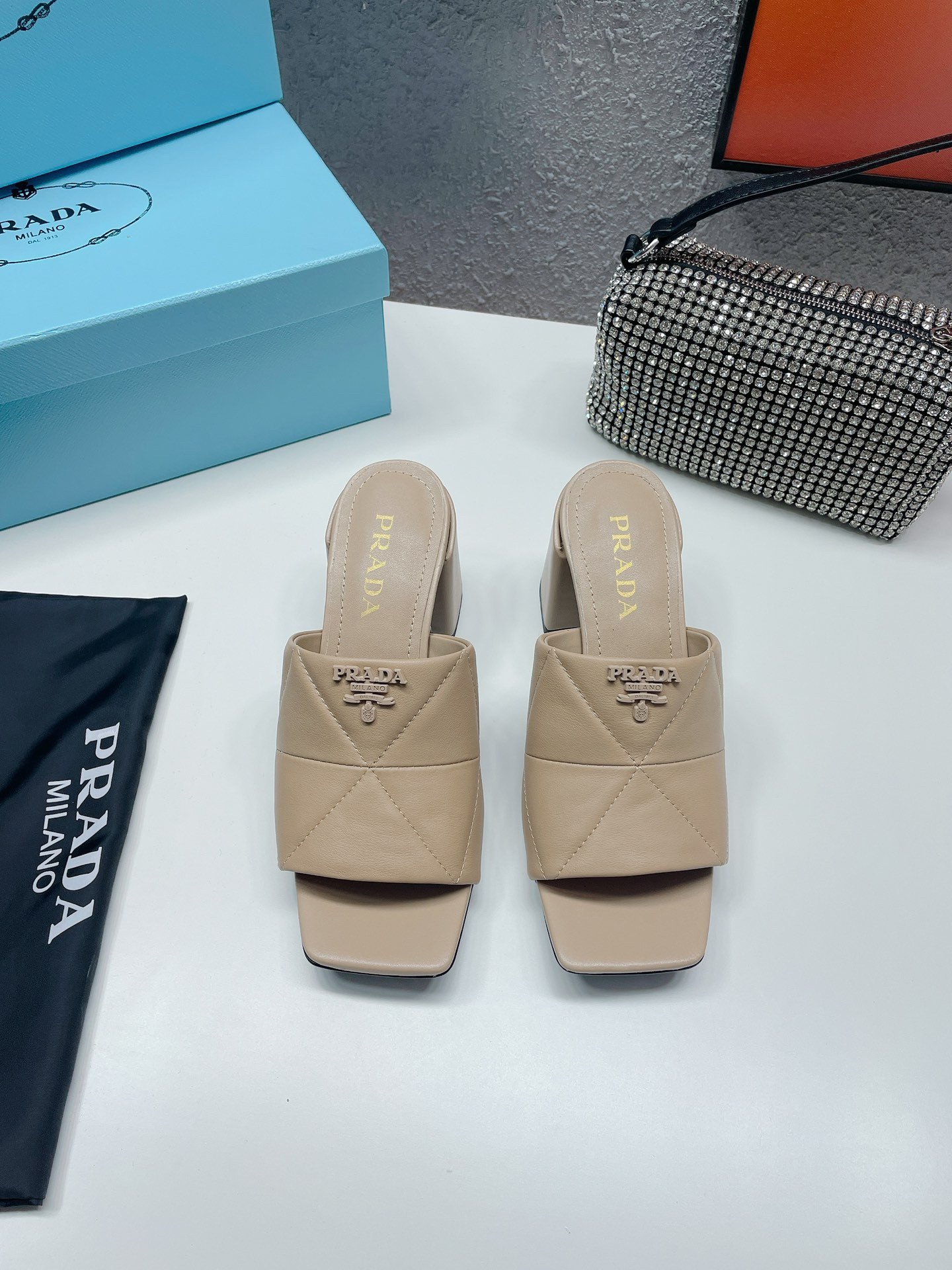 Prada Heeled Slide Sandals 65mm In Beige Nappa Leather