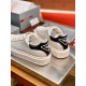 Prada Women's Macro Sneakers In White and Black Leather