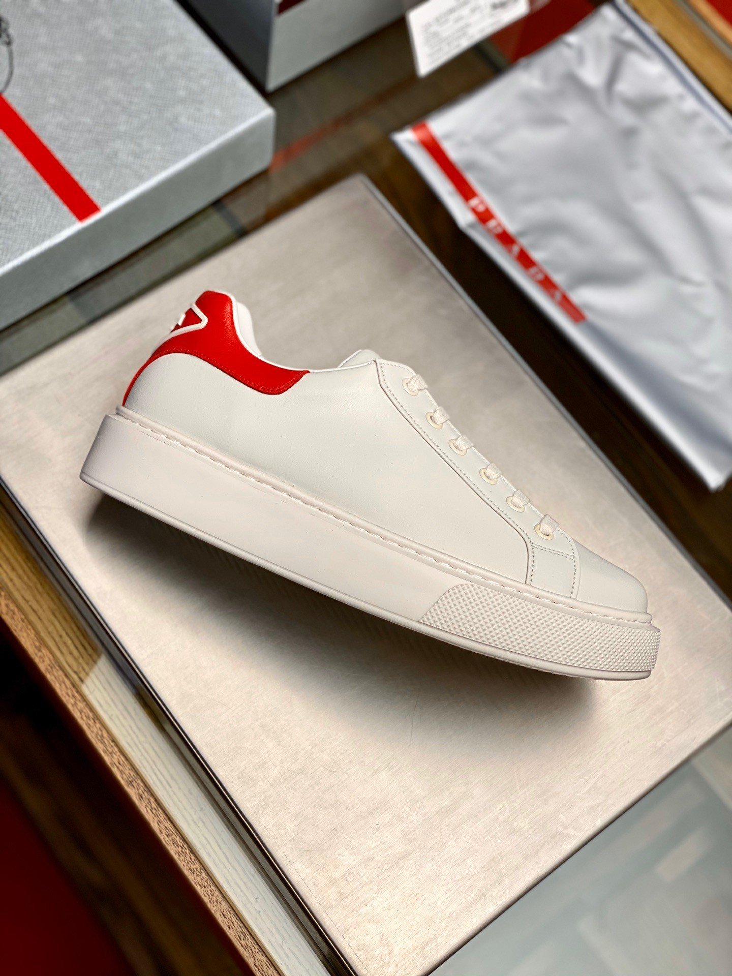 Prada Women's Macro Sneakers In White and Red Leather