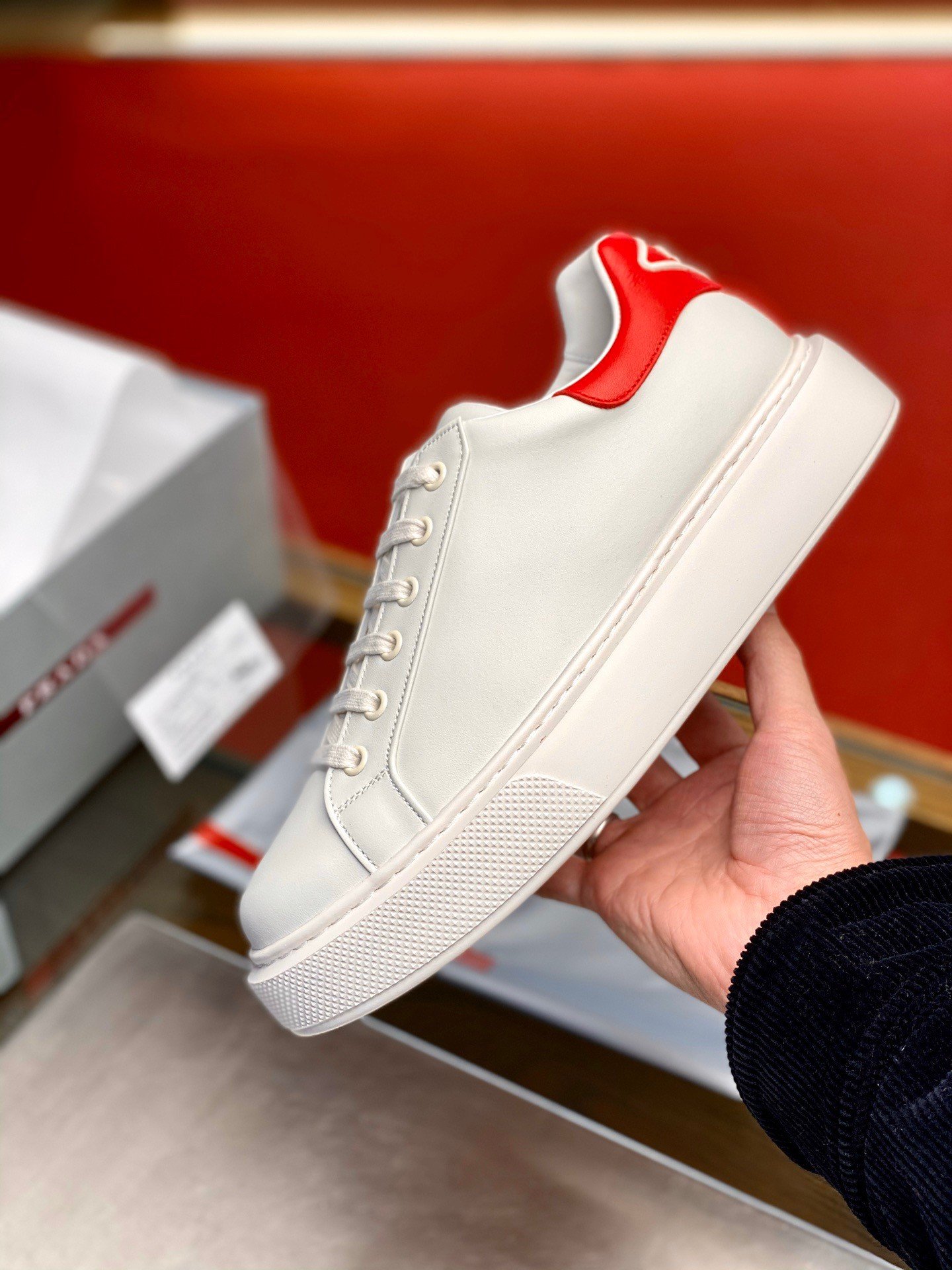 Prada Women's Macro Sneakers In White and Red Leather