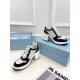 Prada Downtown High-heeled Sneakers in Black and White Leather