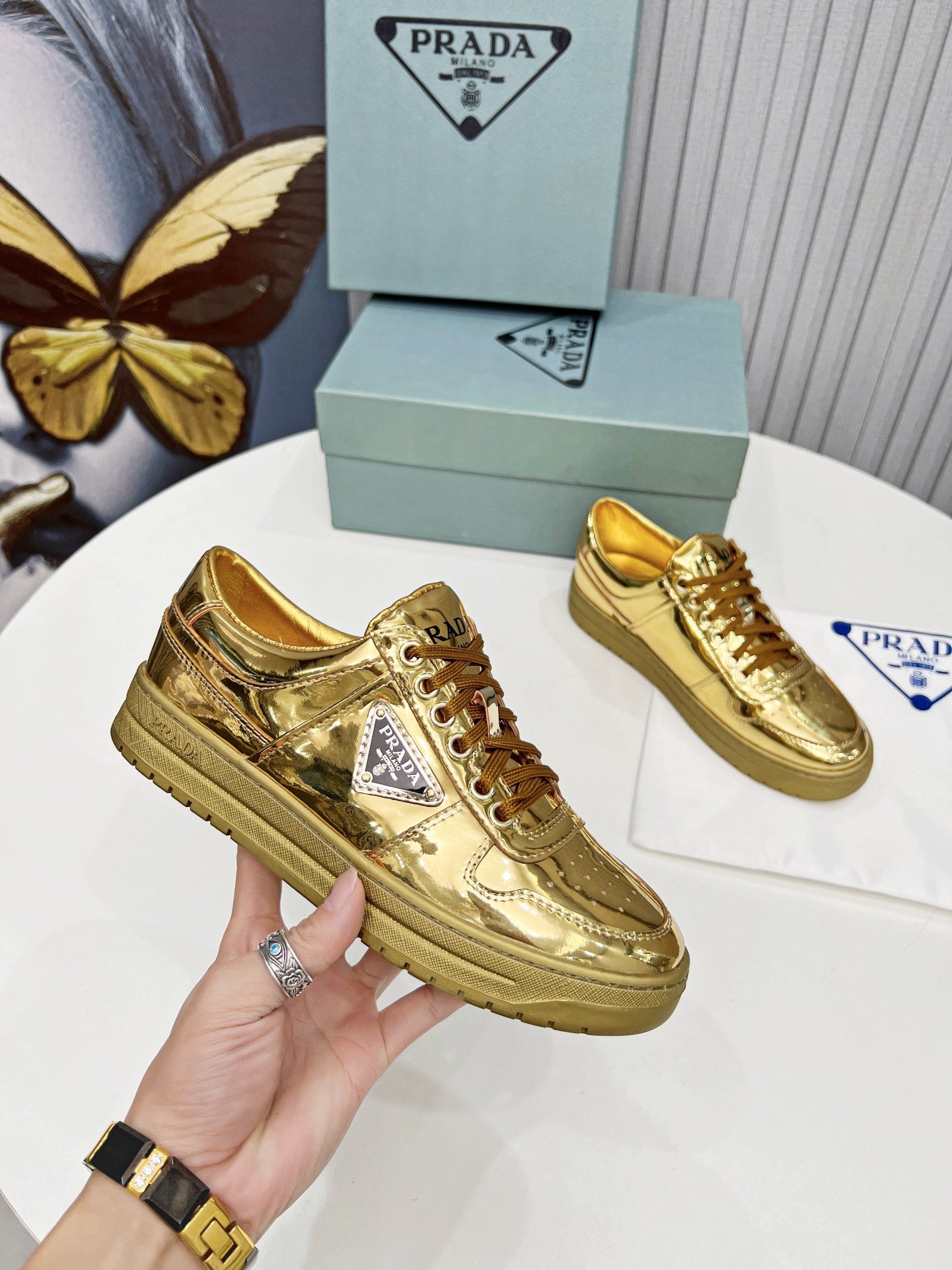 Prada Women's Downtown Sneakers In Gold Metallic Leather