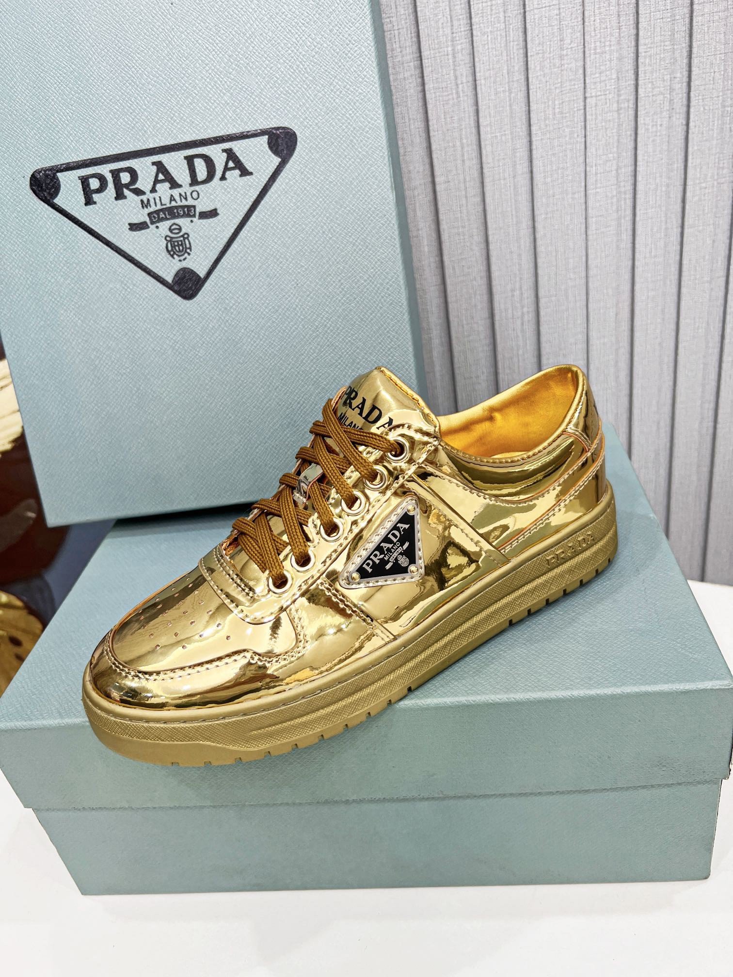 Prada Women's Downtown Sneakers In Gold Metallic Leather