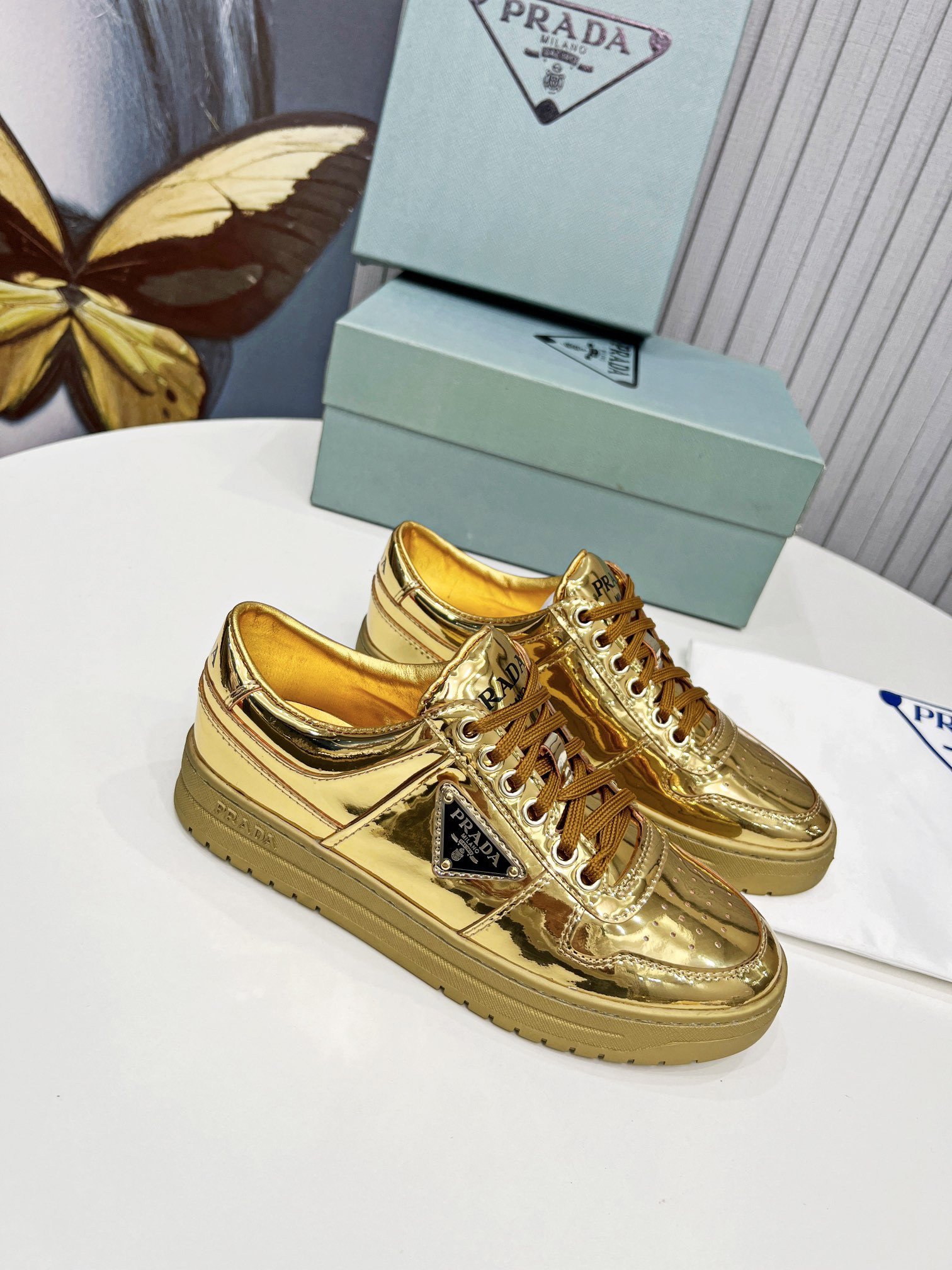 Prada Women's Downtown Sneakers In Gold Metallic Leather