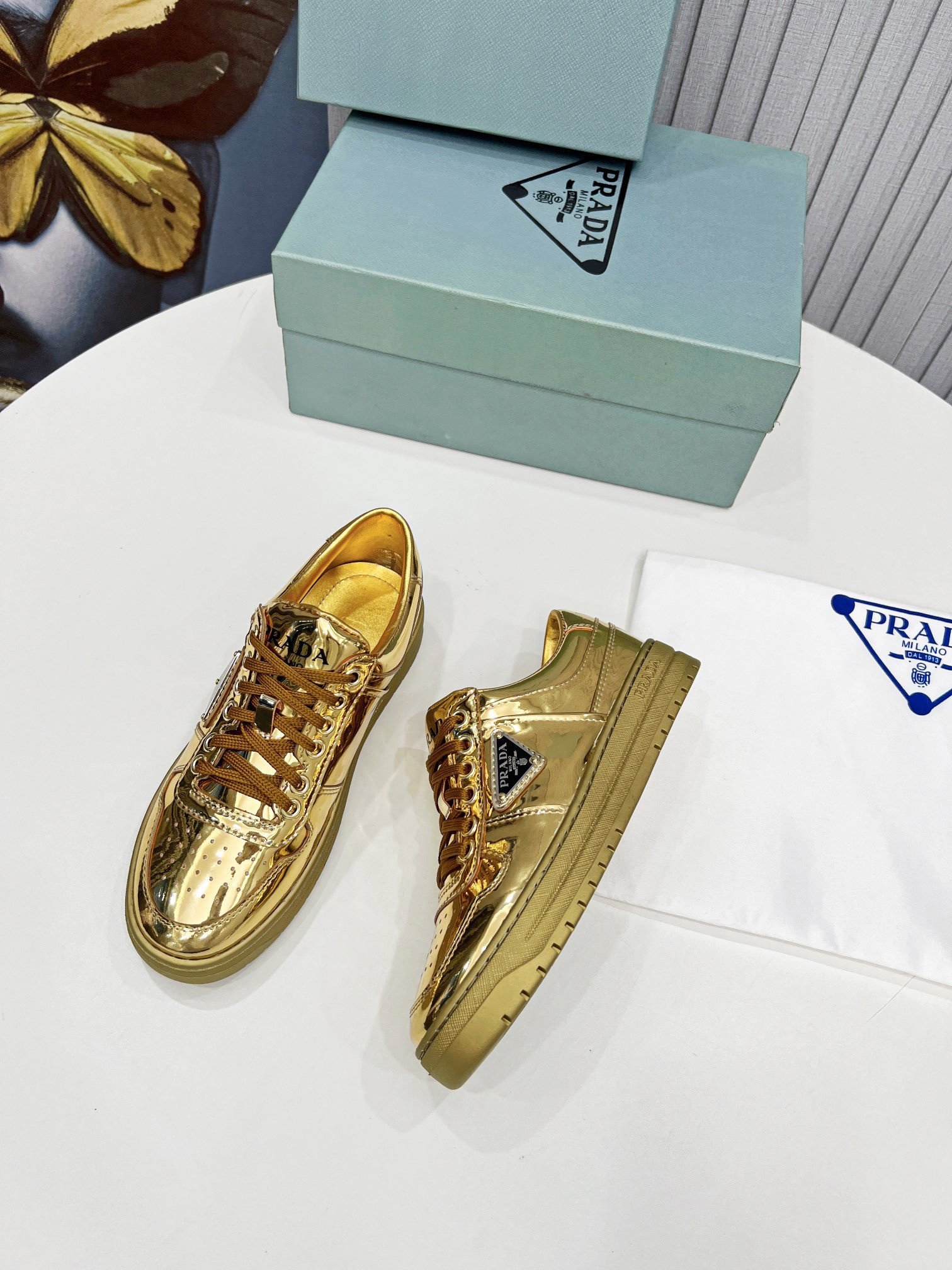 Prada Women's Downtown Sneakers In Gold Metallic Leather