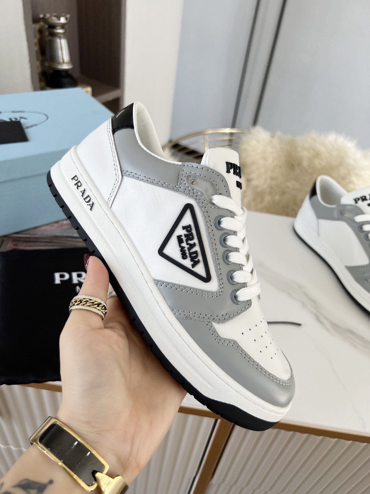 Prada District Sneakers in White and Grey Calfskin