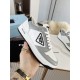 Prada District Sneakers in White and Grey Calfskin