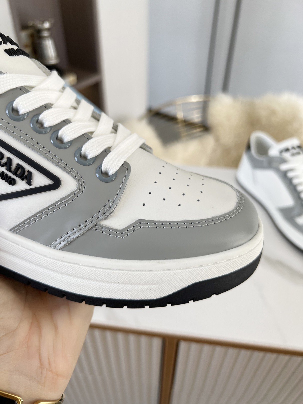 Prada District Sneakers in White and Grey Calfskin