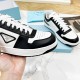 Prada Downtown Sneakers in White and Black Calfskin