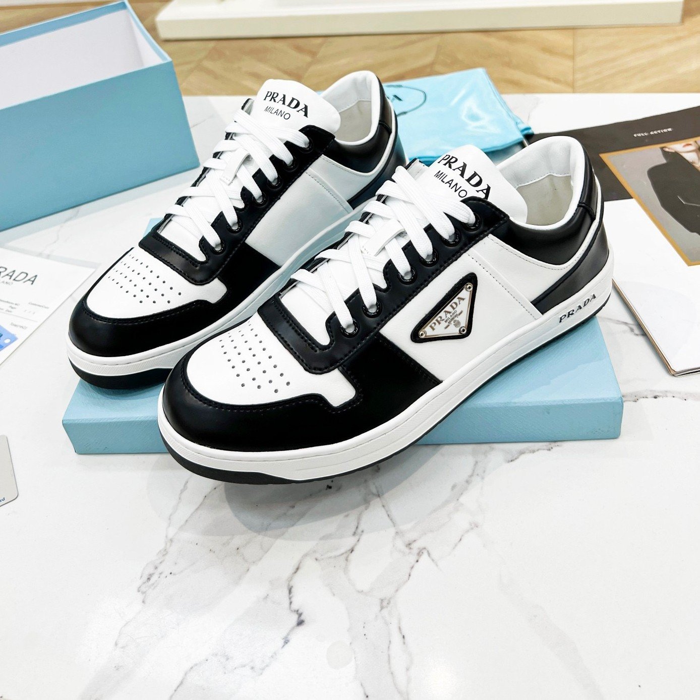 Prada Downtown Sneakers in White and Black Calfskin