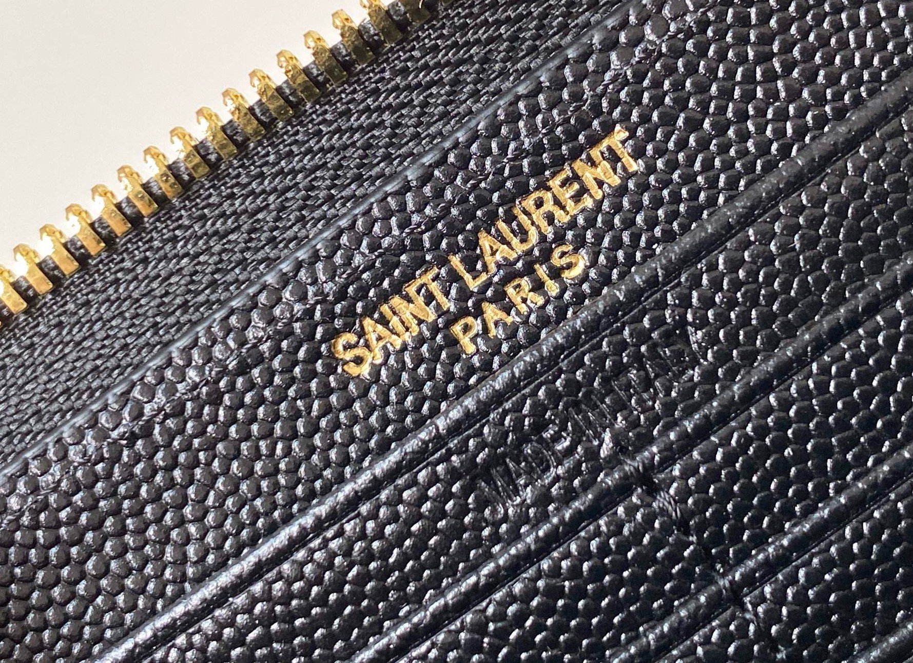 Saint Laurent Cassandre Zip Around Wallet in Black Matelasse Leather