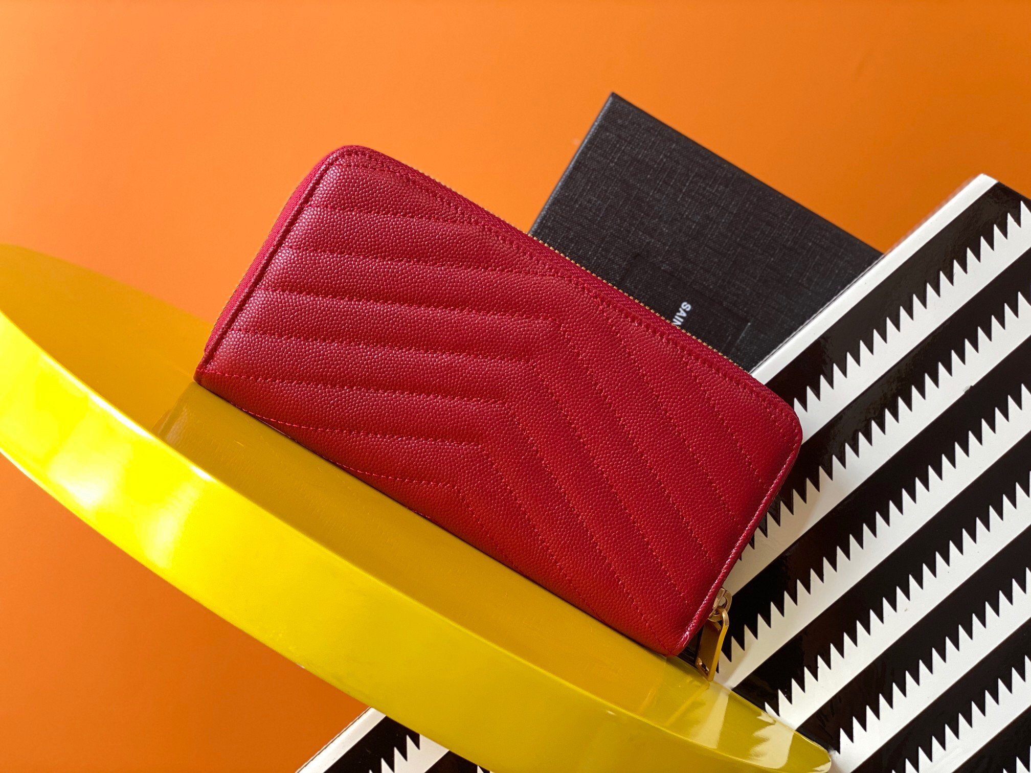 Saint Laurent Cassandre Zip Around Wallet in Red Matelasse Leather